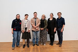 Group photo with the scholarship recipient and the jury