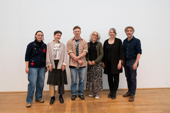 Group photo with the scholarship recipient and the jury